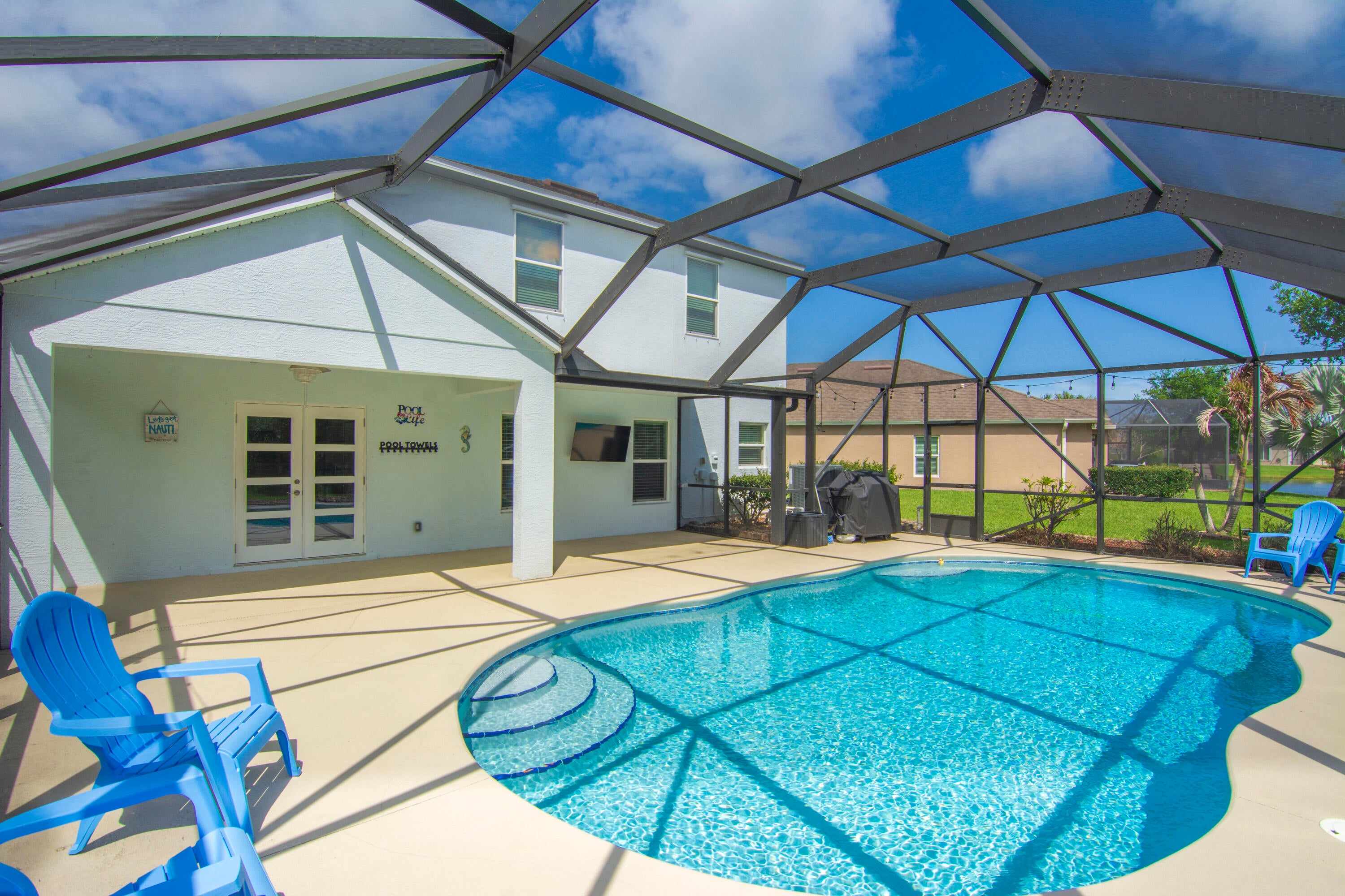 Experience Gated Living with Pool and Lake Views