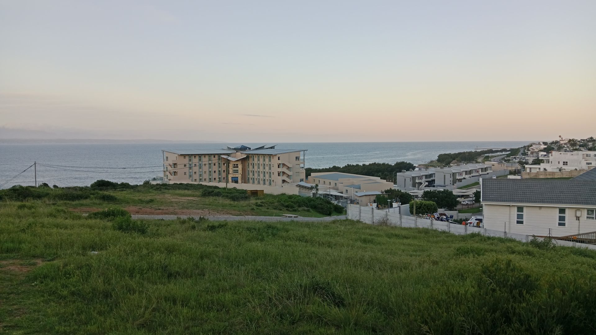 Rare Coastal Canvas with Uninterrupted Sea and Mountain Views