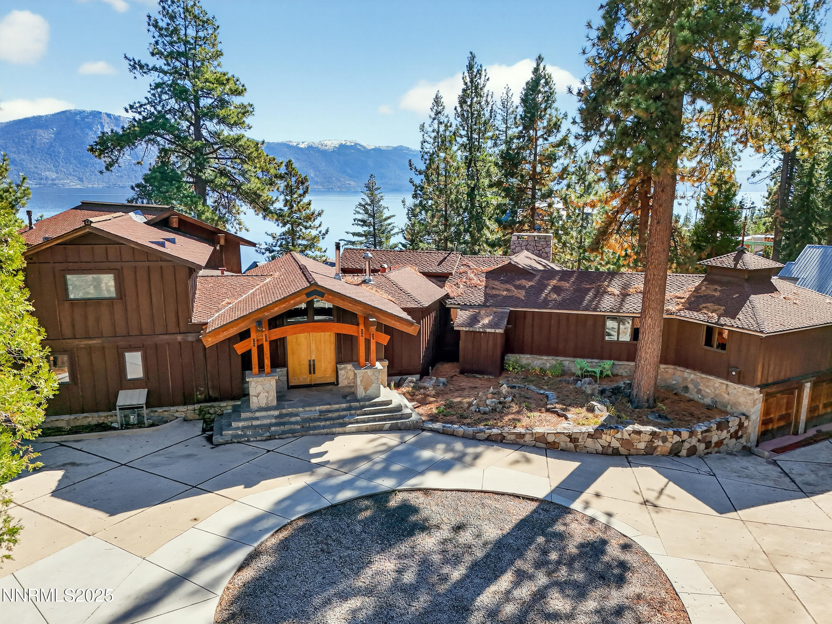 Elegant Alpine Compound with Main House & Cottages