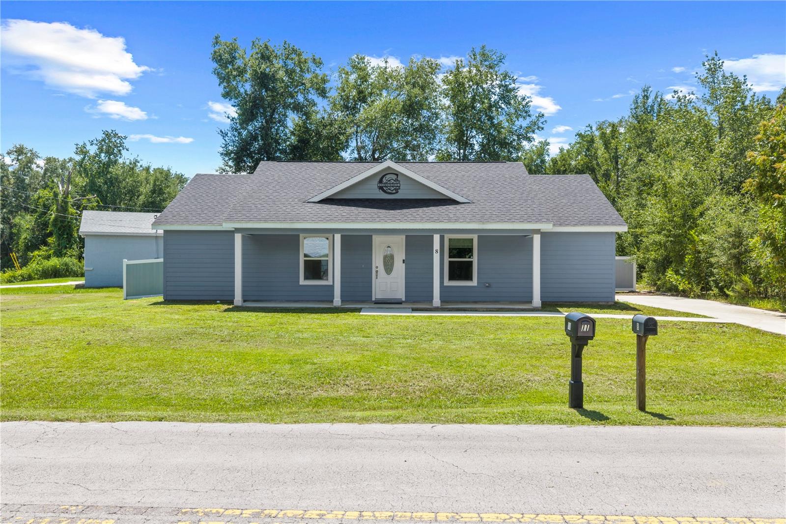 Corner Lot Charm with Modern Convenience and Privacy