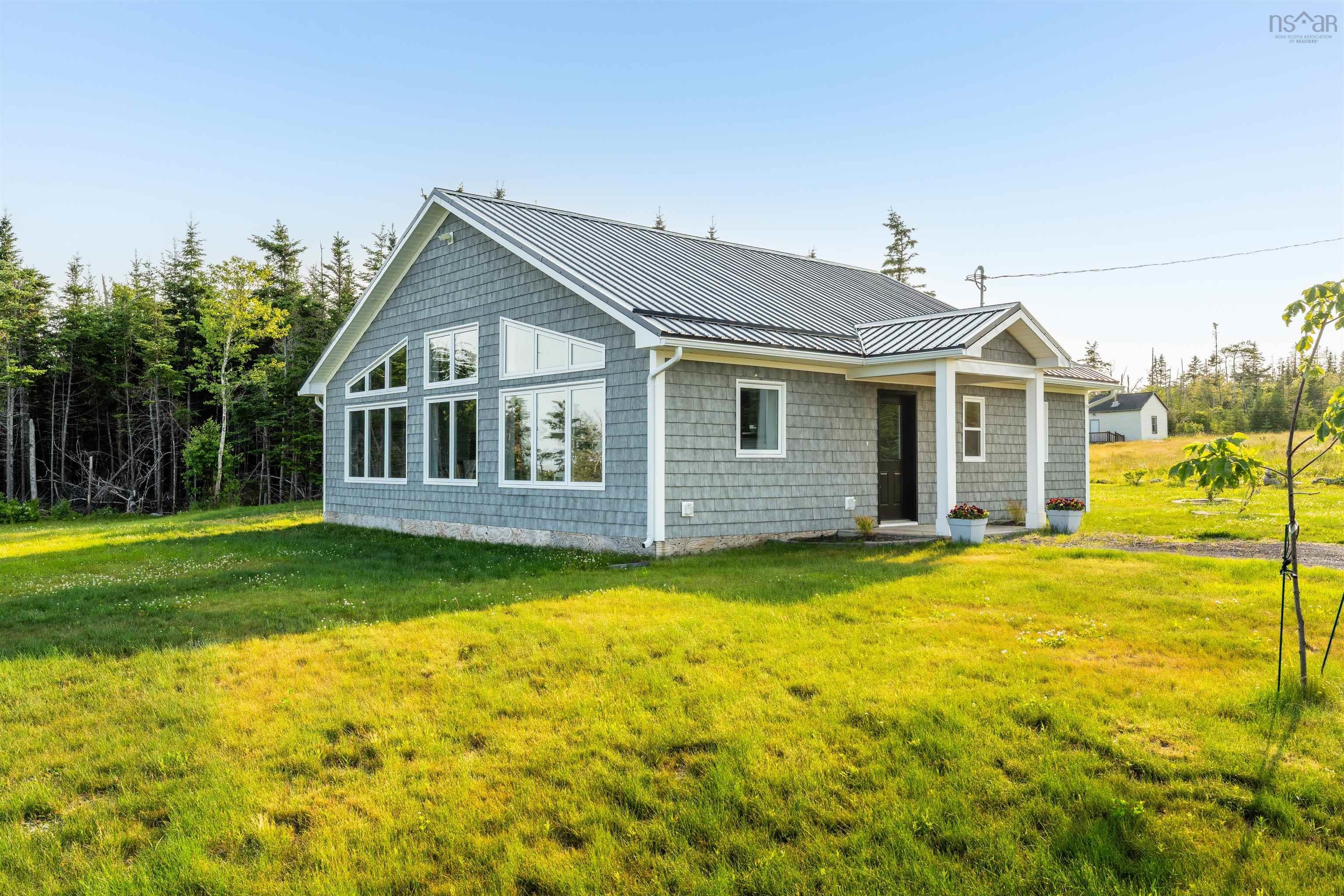 Coastal Luxury: New ICF Home with 220ft Private Beach