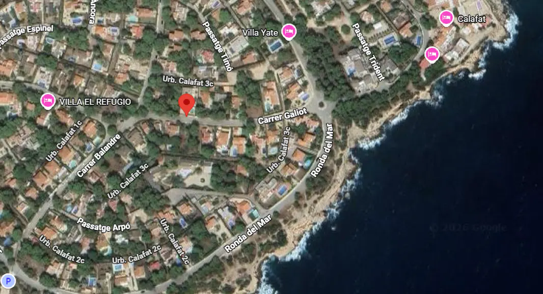 Aerial map view of a coastal residential neighborhood in Calafat with a red location pin marking a specific property.