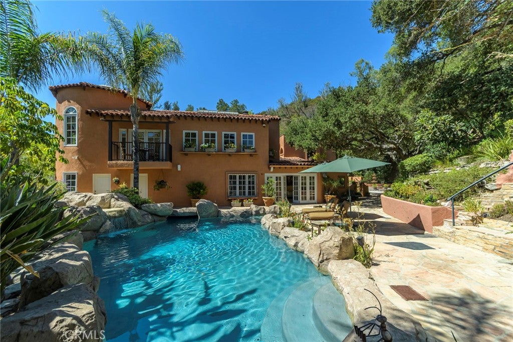 Discover Your 1927 Spanish Estate with Multiple Residences