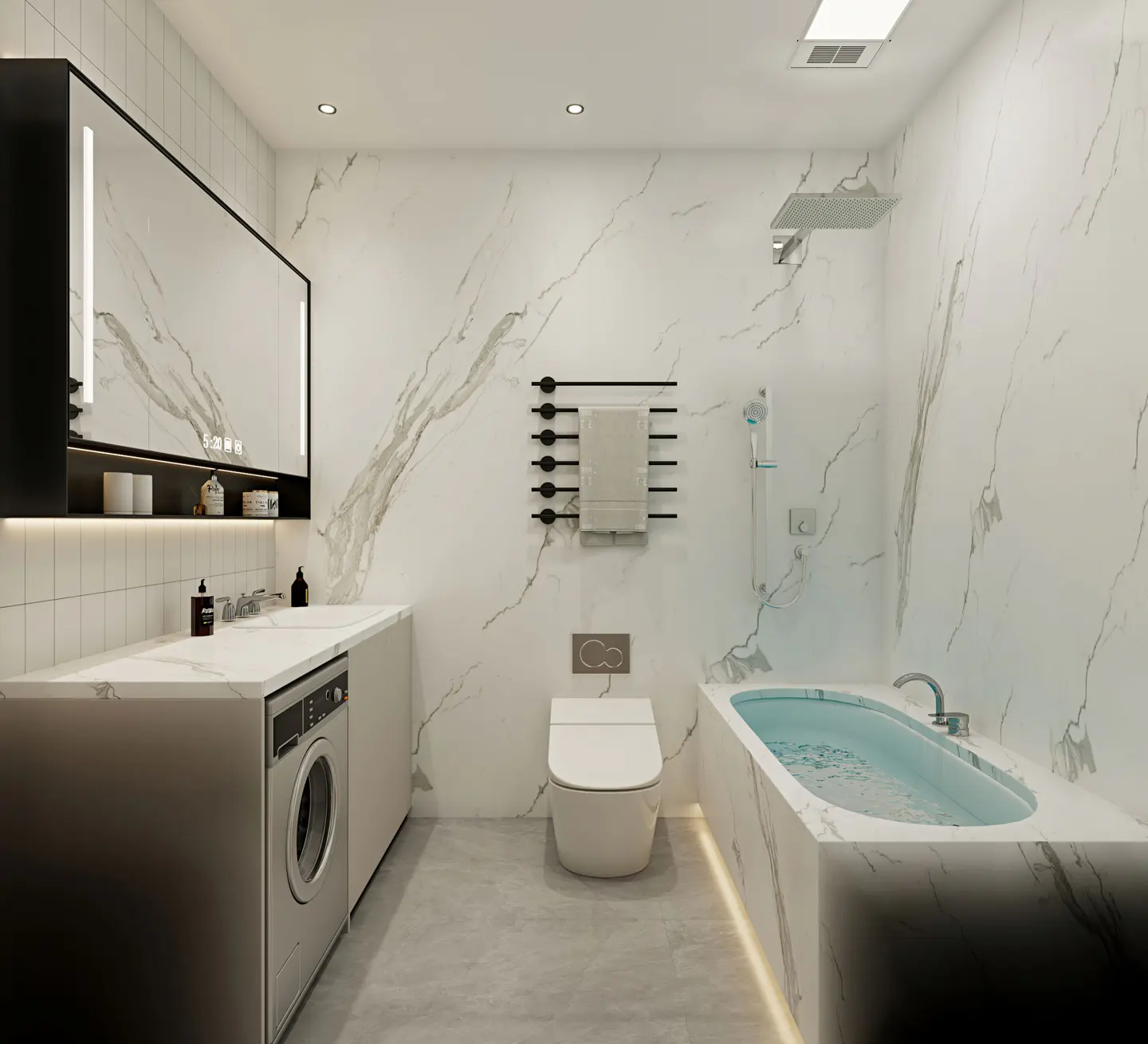 A modern bathroom with marble walls, a white toilet, a bathtub filled with water, and a washing machine.