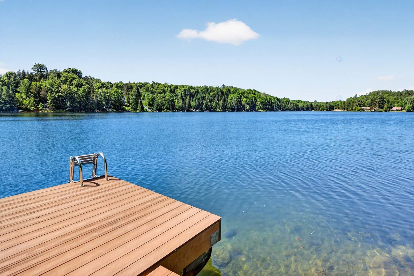 Lakefront cottage blending vintage and modern style.
