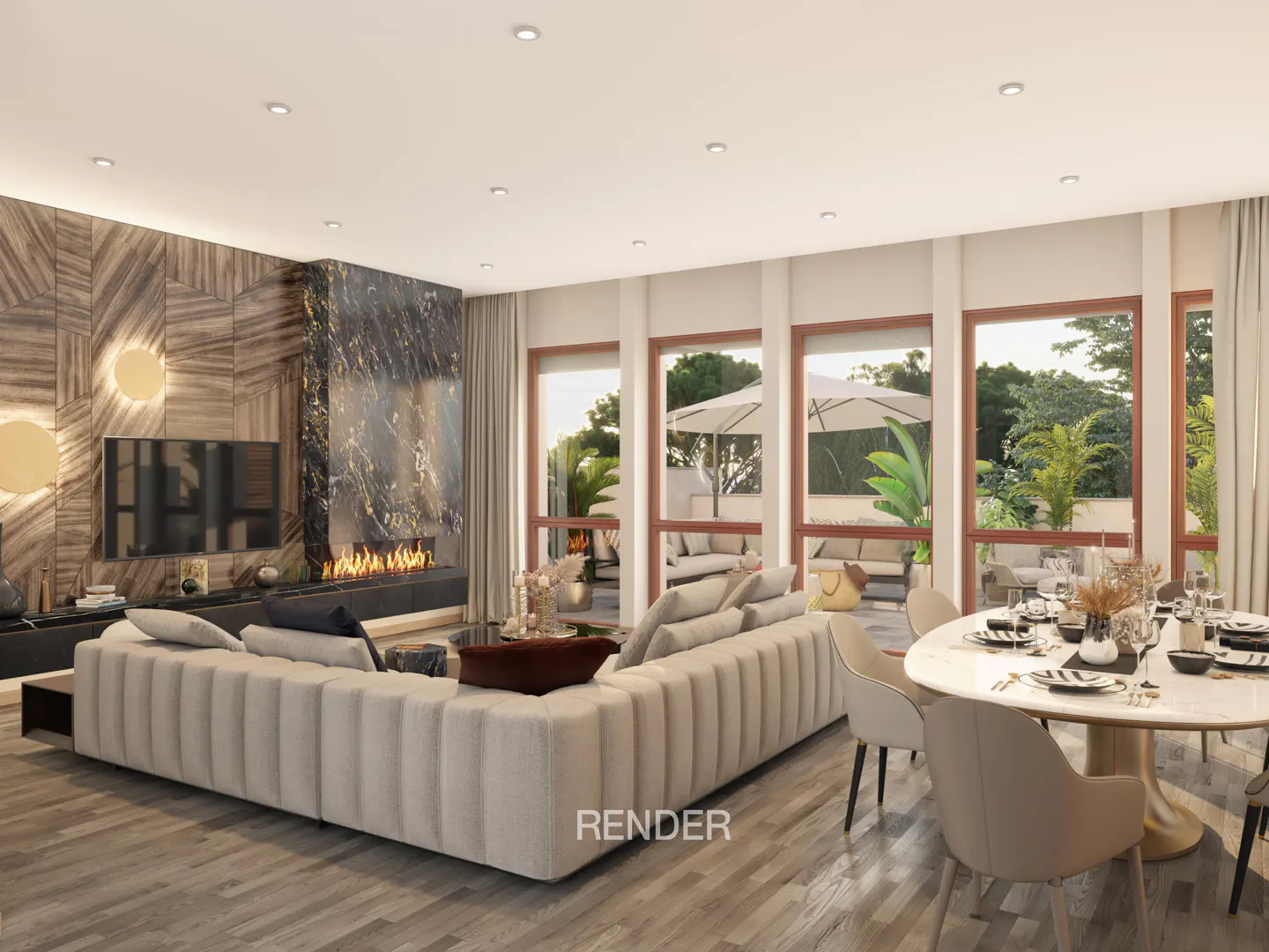 Living room with a fireplace, large sofa, and dining table set for a meal. Large windows overlook a patio.