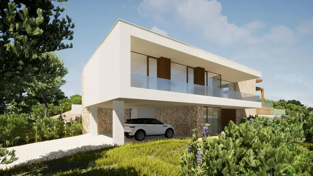 Modern two-story house with white walls, stone accents, and a white car parked underneath. Lush greenery surrounds the property.