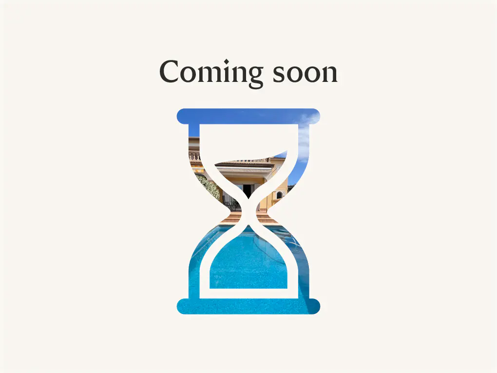 "Coming soon" text above an hourglass filled with a house and pool scene, set against a white background.