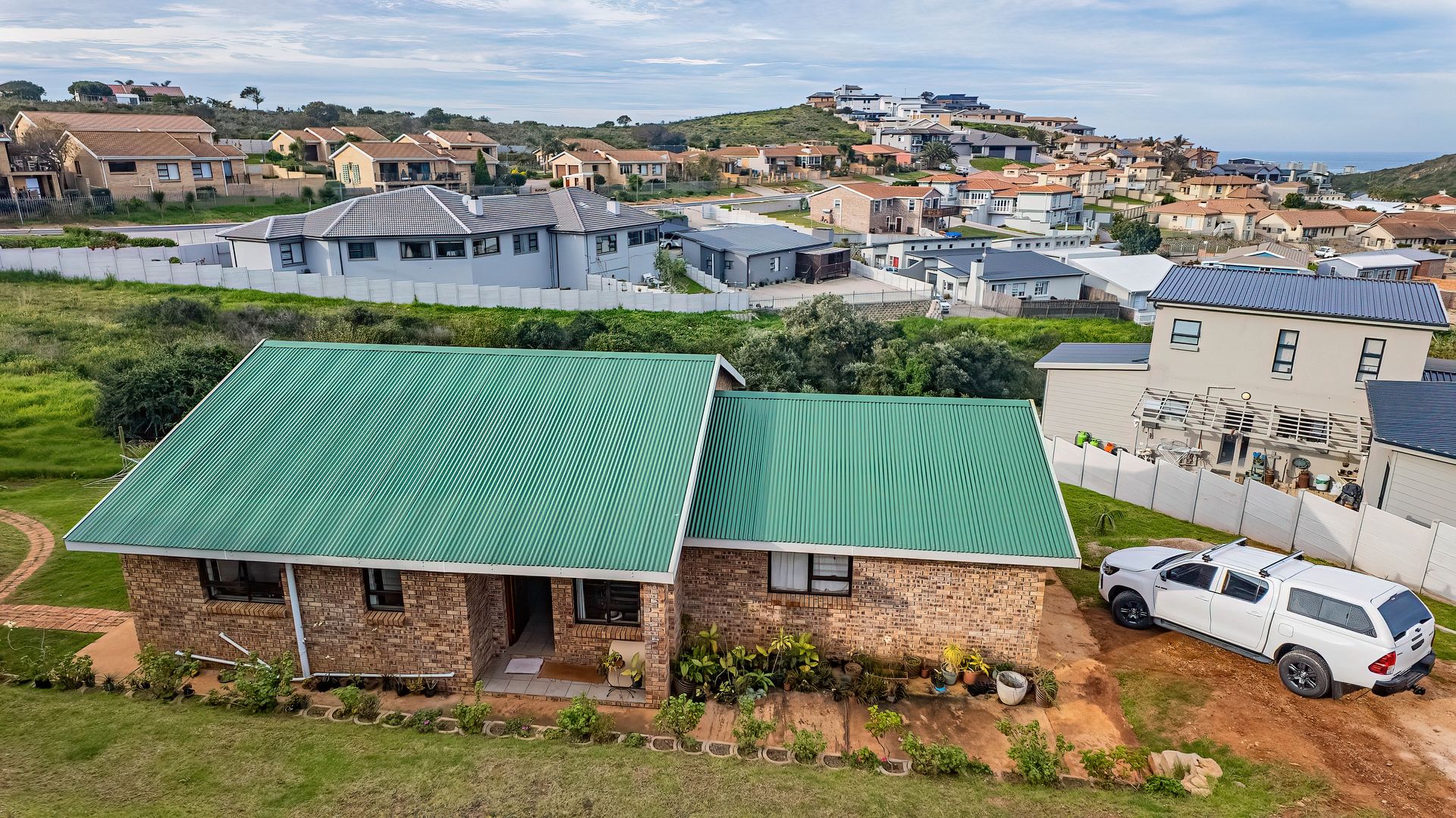 Charming 1-Bed Home with Sea Views & Expansive Garden in Island View