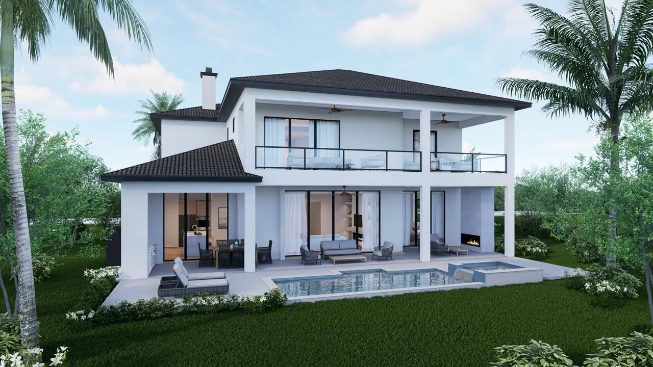Two-story white house with a pool and patio, surrounded by green grass and palm trees.