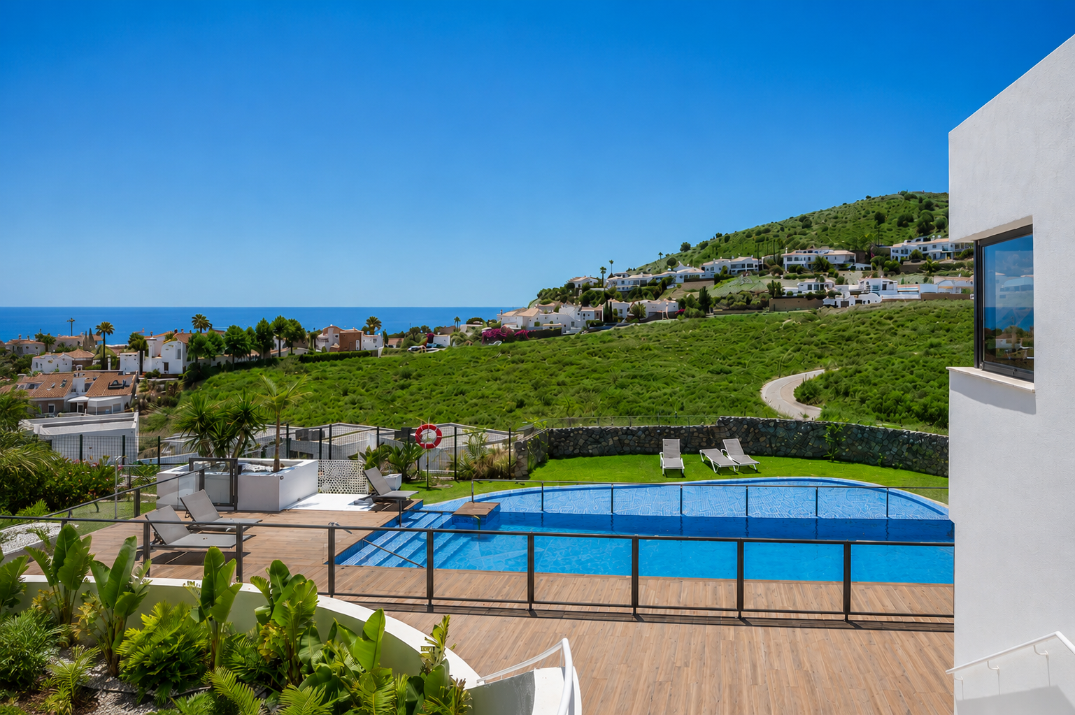Contemporary semi-detached villa with private garden and sea views