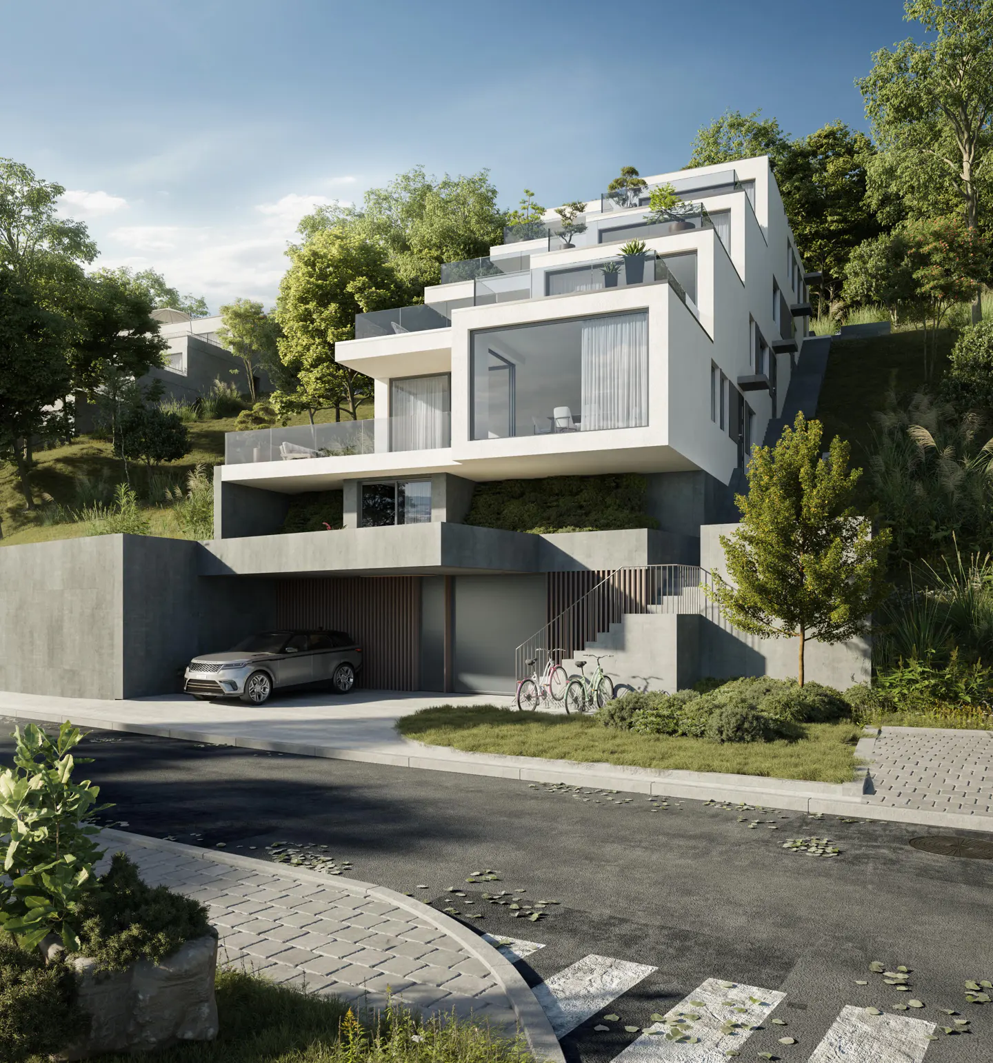 Modern white house with large windows on a green hillside. A silver car is parked in the garage, and two bicycles are near the stairs.