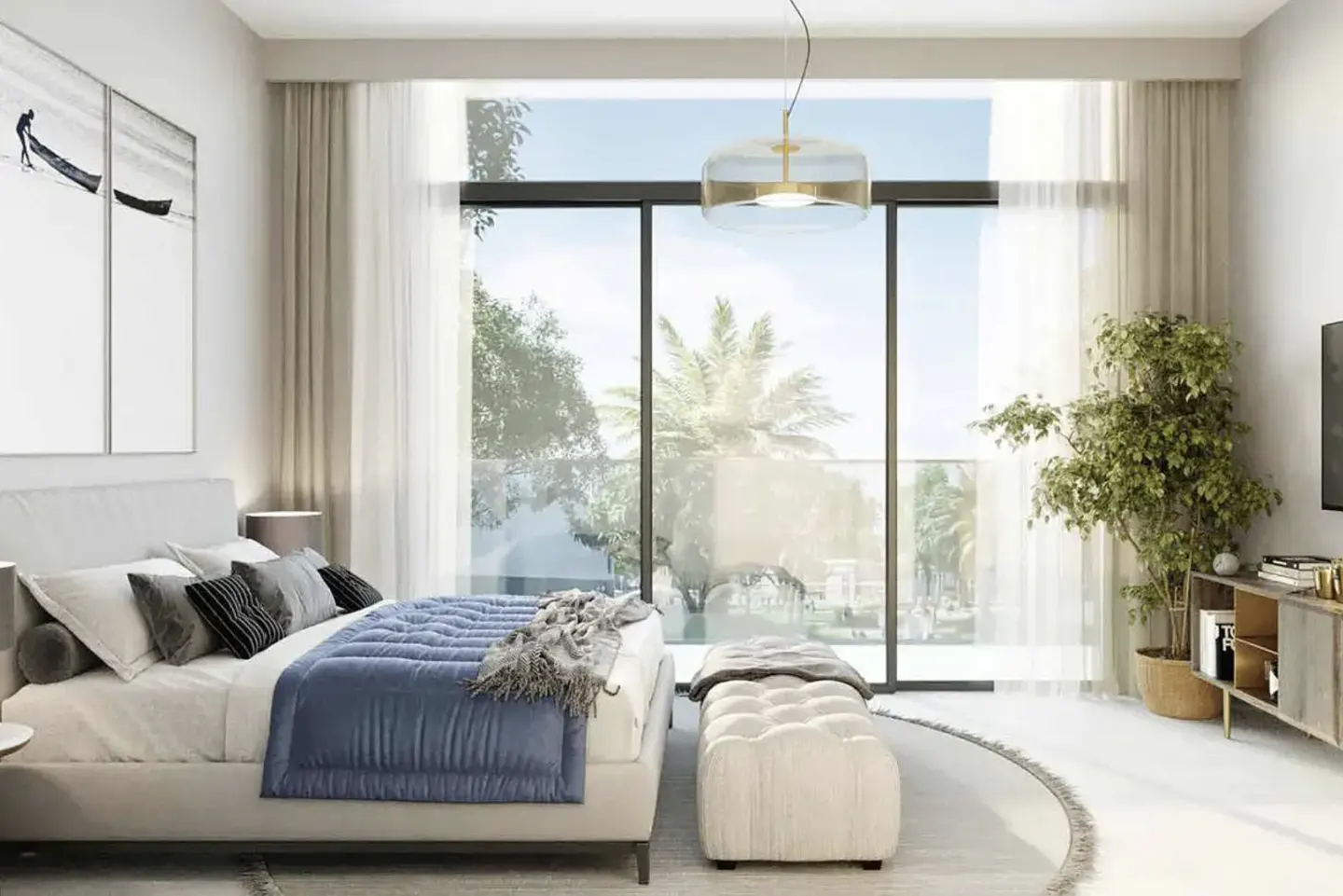 Bright bedroom with a large window view. A bed with blue blanket, white bench, and potted plant are visible. Artwork hangs on the wall.