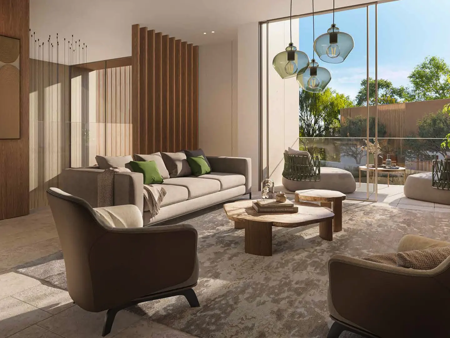 Living room with a gray sofa, green pillows, and a wooden coffee table. Three glass pendant lights hang near a glass door to a balcony.