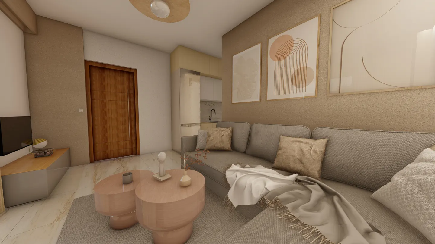 Modern living room with a grey sofa, two round blush coffee tables, abstract wall art, and a wooden door on marble floors.