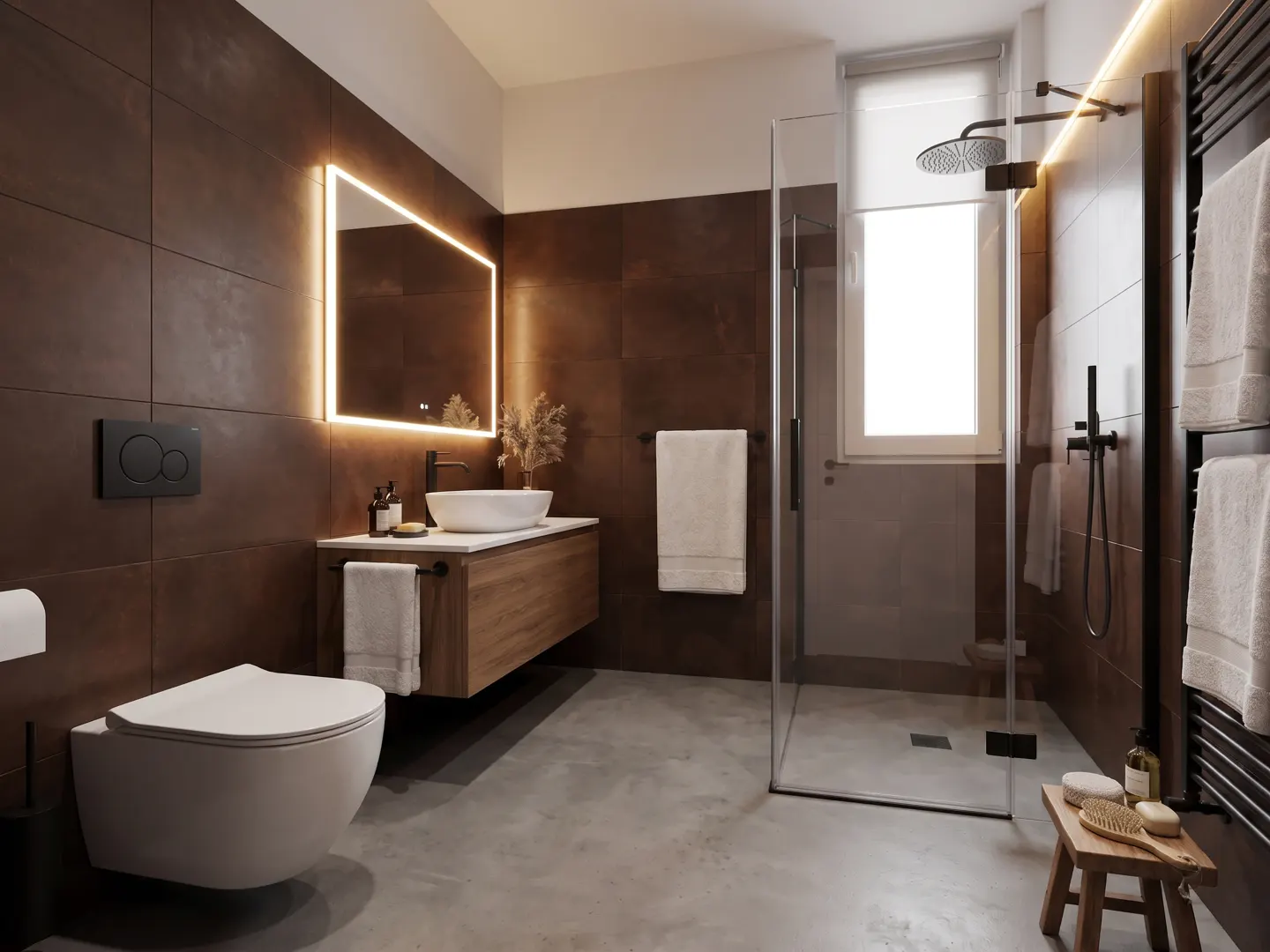 Modern bathroom with brown tile walls, a white toilet, a wood vanity with a white sink, and a glass-enclosed shower.