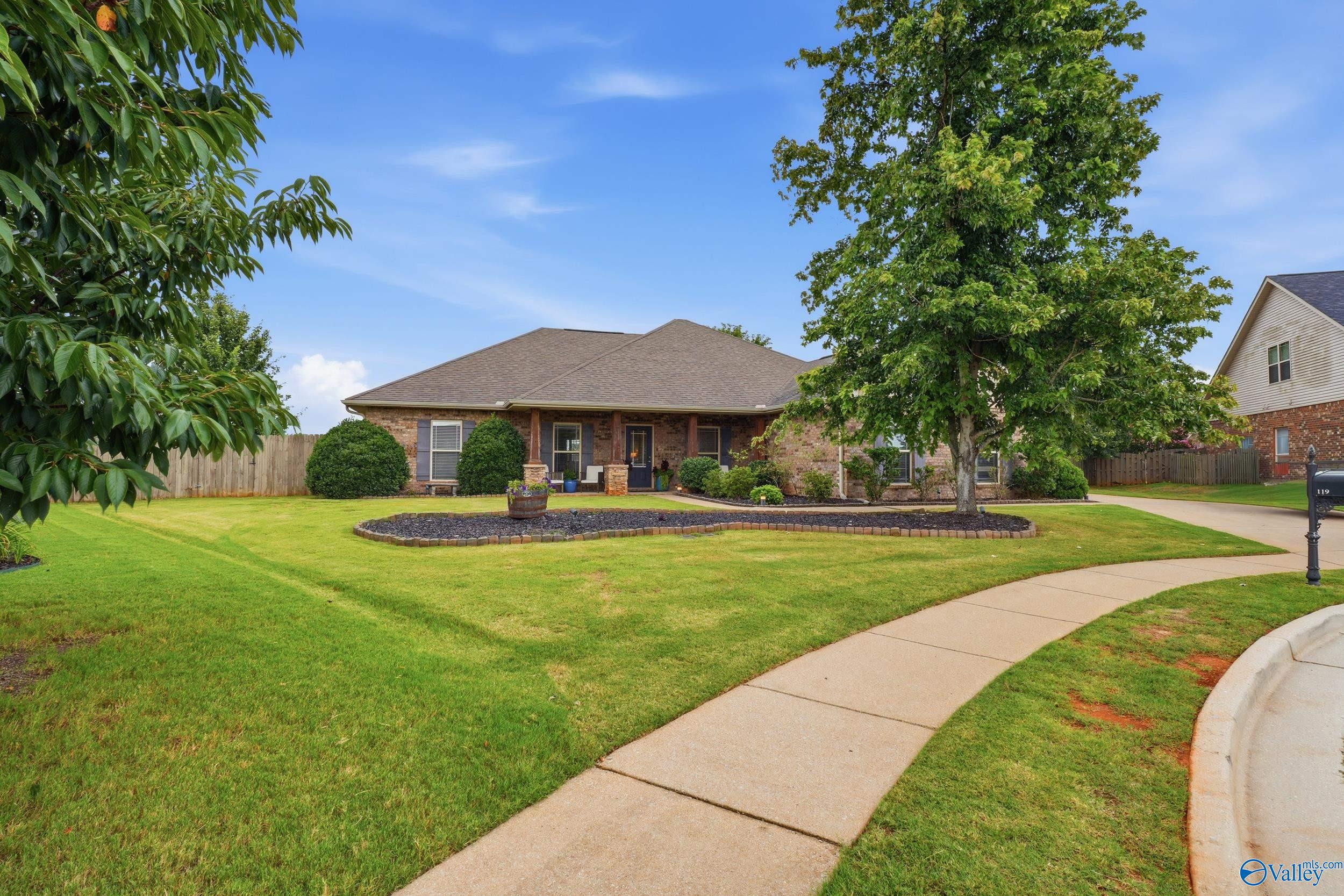 Beautiful Brick Home with a Private Backyard Retreat