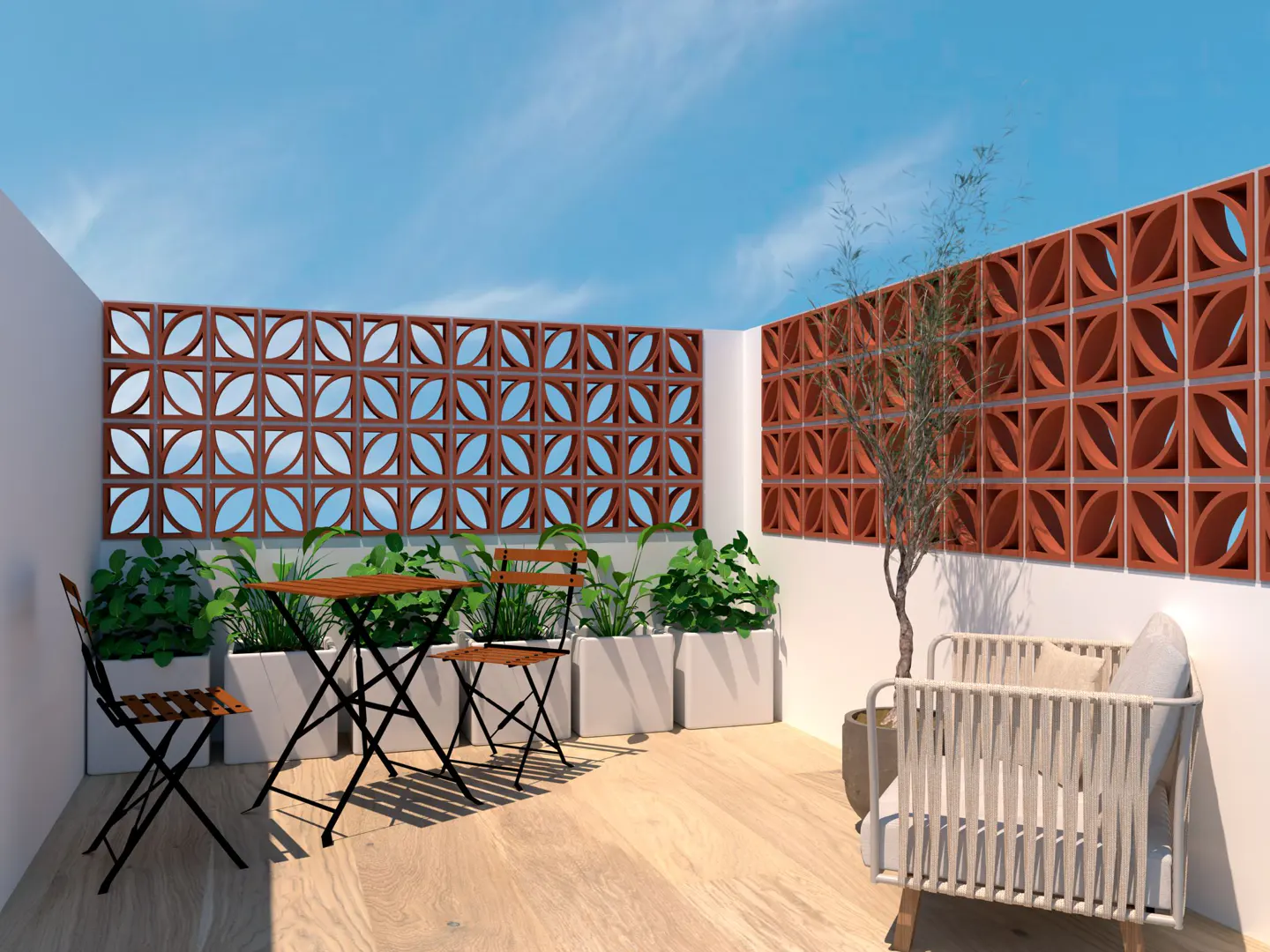 Outdoor patio with a table, chairs, and a white sofa. The patio has a terracotta breeze block wall and potted plants. The floor is light wood.