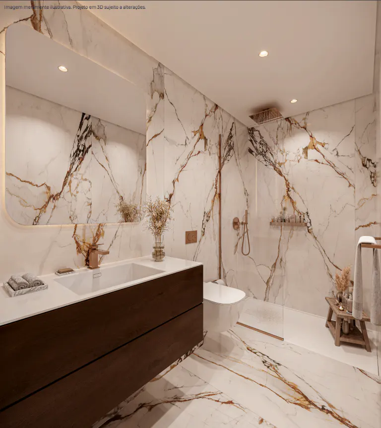A modern bathroom with white marble walls and floor, a dark wood vanity, and a glass-enclosed shower.