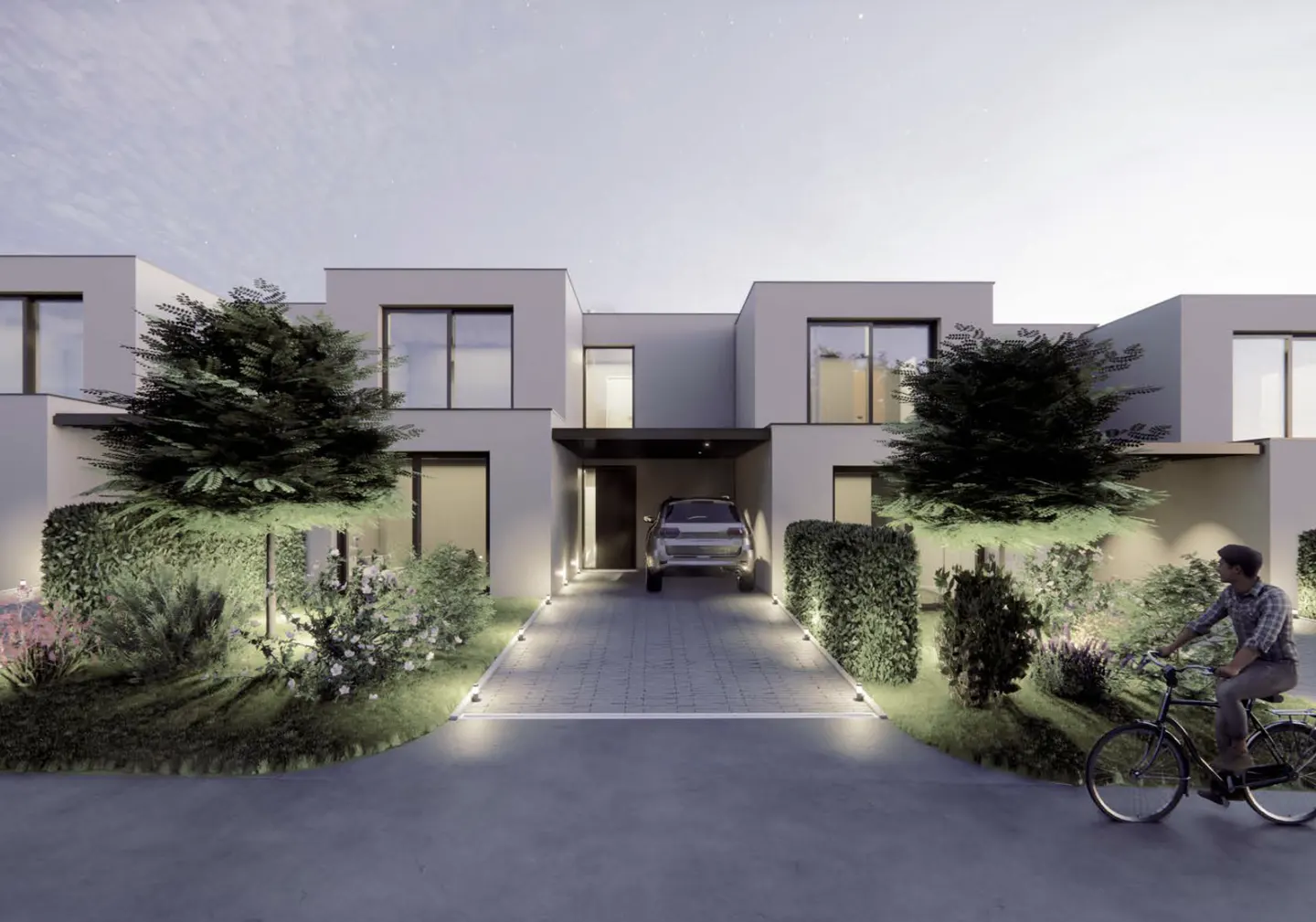 Modern townhouses with a car parked in the driveway. A man rides a bicycle in front of the houses.