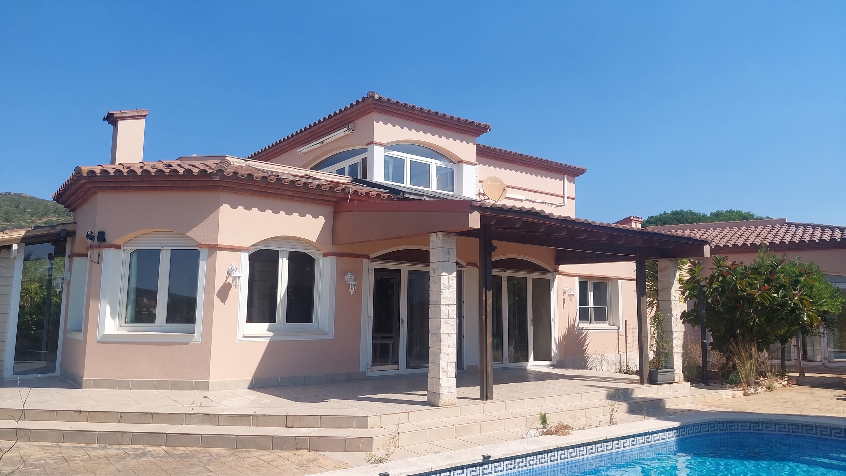 Large house with two attached single-family homes with views of Bonmont Golf