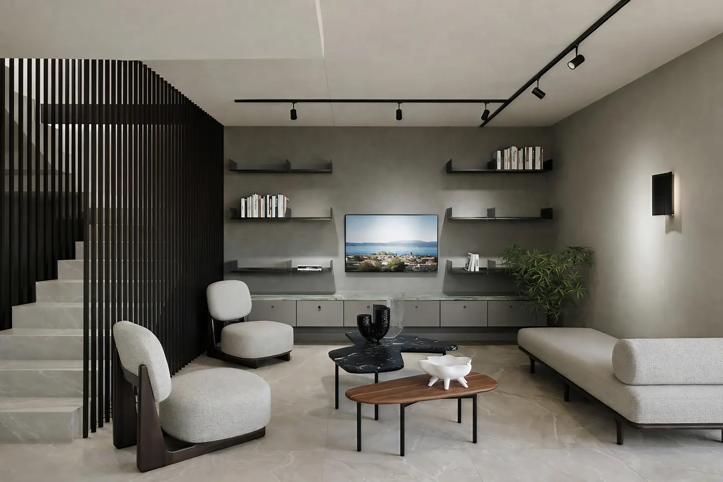 A modern living room with gray walls, track lighting, and floating shelves. Two white chairs, a sofa, and a TV are also visible.