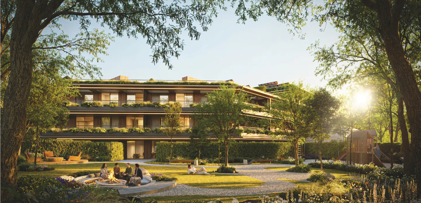 Exterior view of a modern, multi-story apartment building with a lush green courtyard, a fire pit with people, and a playground.