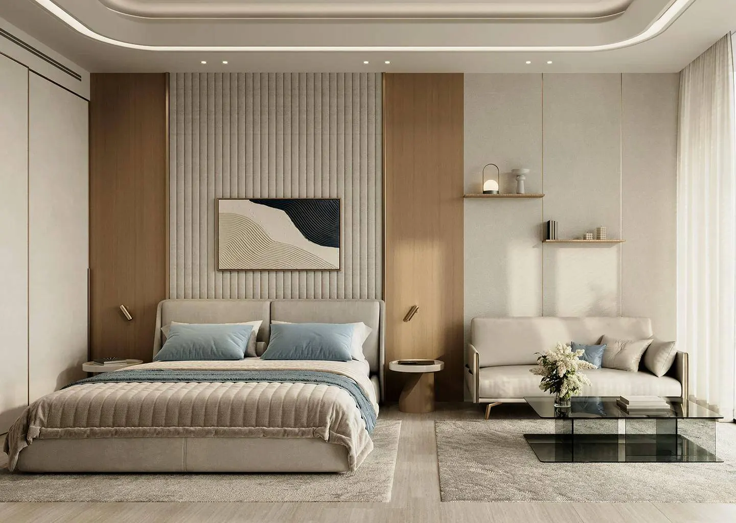 A modern bedroom with a bed, sofa, glass table, and neutral color scheme. Artwork hangs above the bed. Shelves are on the wall.
