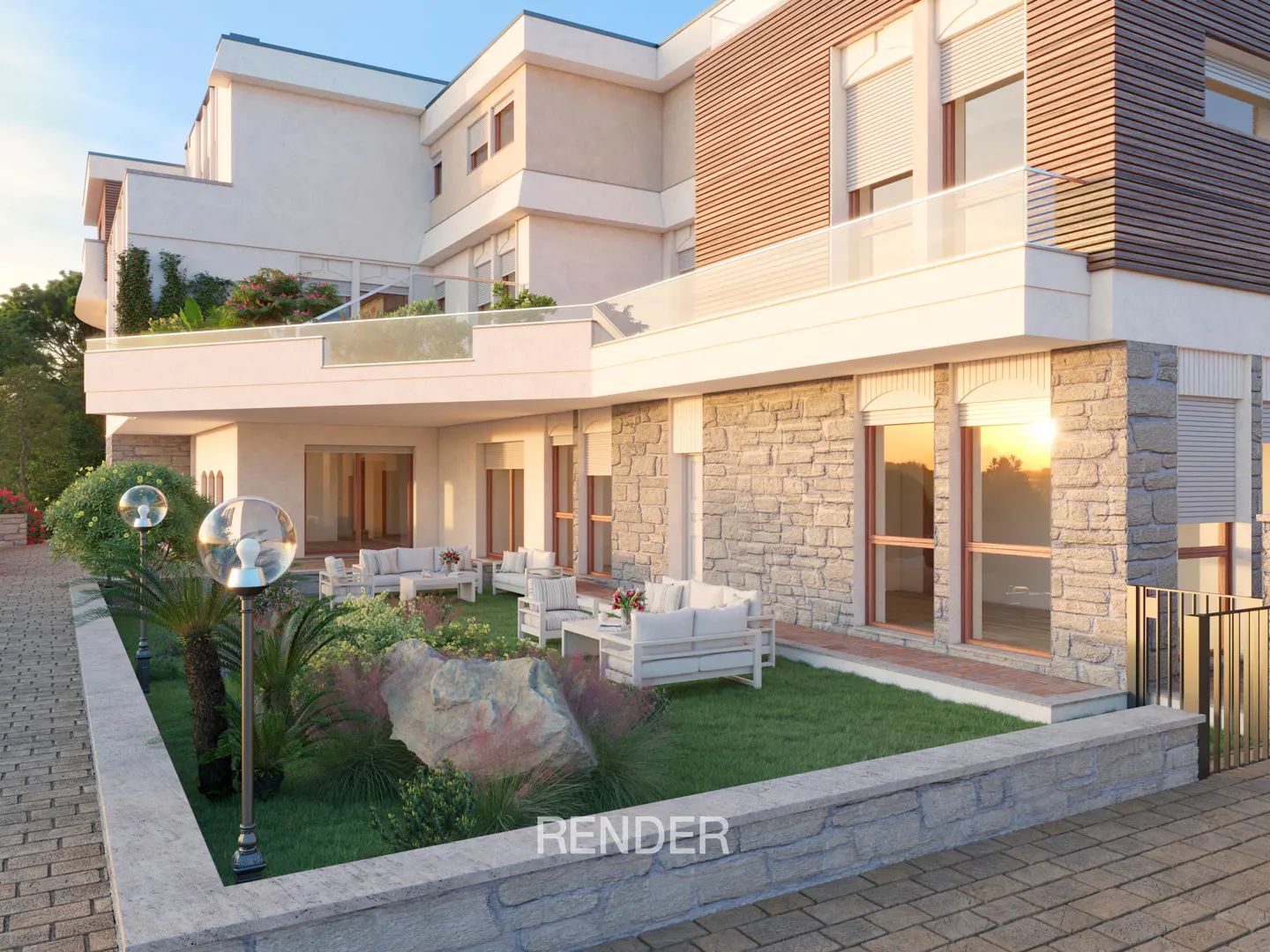 Exterior view of a multi-story building with a stone facade and a patio with white furniture. Landscaped garden with globe lights.