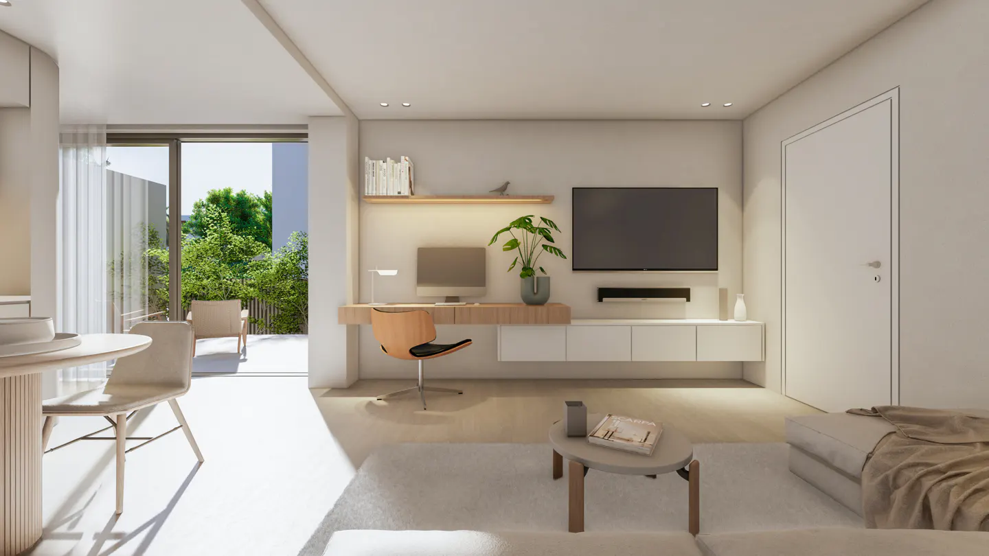 Bright, modern living room with a desk, TV, and outdoor patio view. Neutral colors and minimalist design create a serene atmosphere.