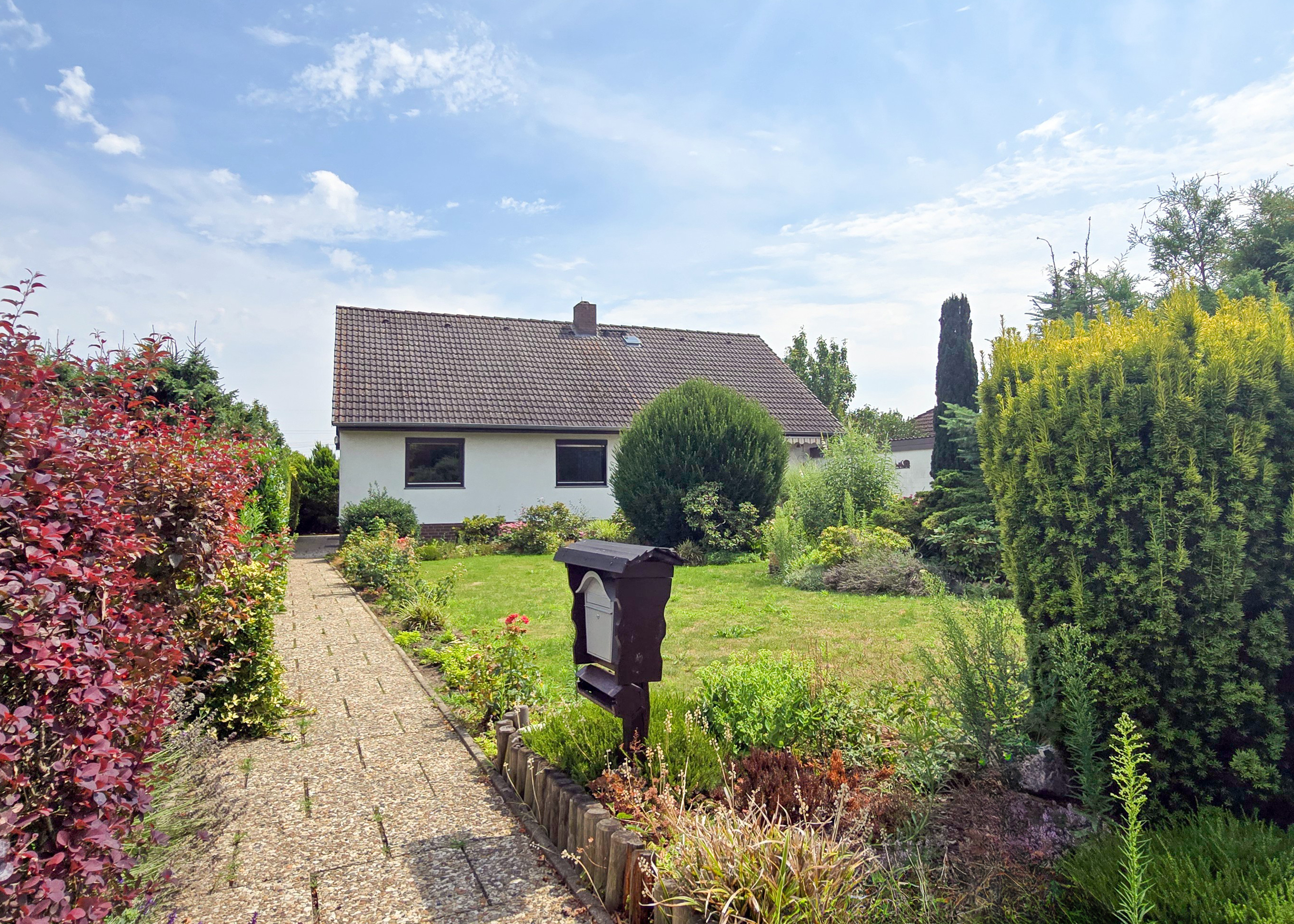 Einfamilienhaus mit Ausbaureserve im Dachgeschoss und großzügigem Westgarten!