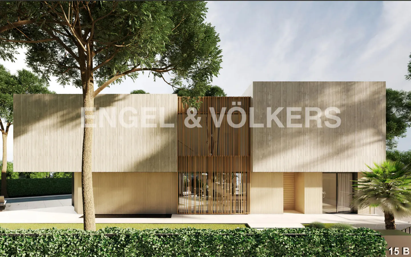 Modern beige house with Engel & Völkers logo. A wooden slat wall is centered. Green trees and bushes surround the property.