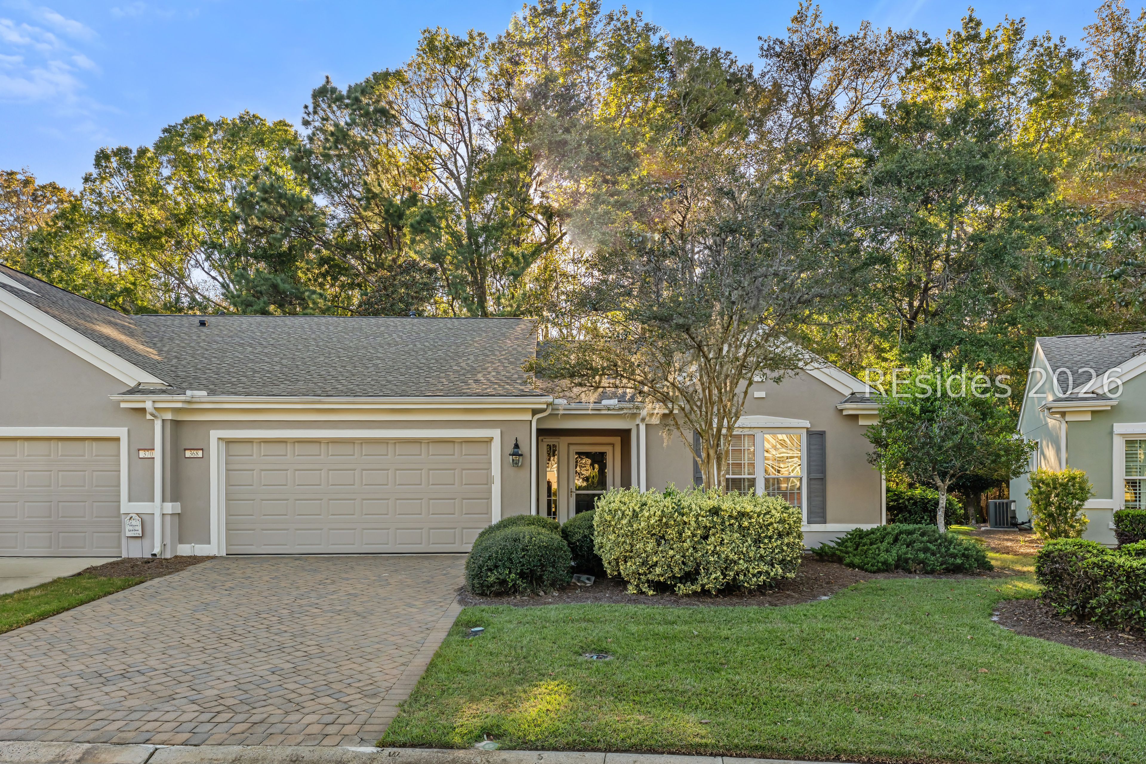 Low-Maintenance Living With a Private Wooded Setting