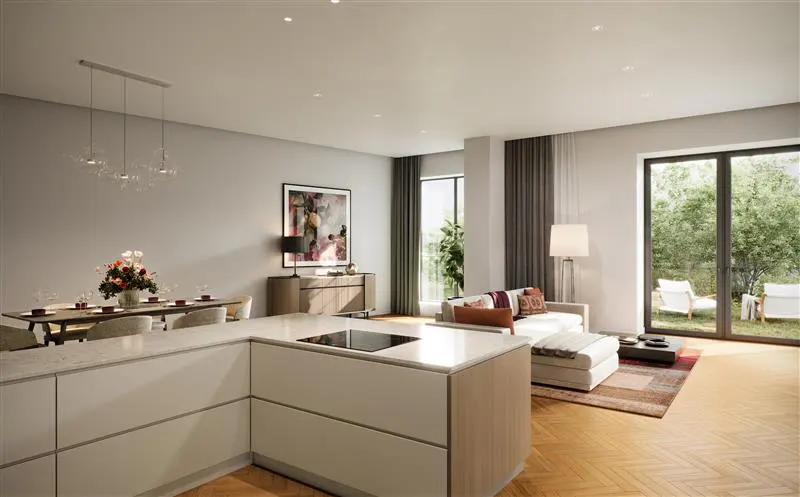 Open-concept living space with a kitchen island, dining table, and a living room with a sofa and a view of the backyard.