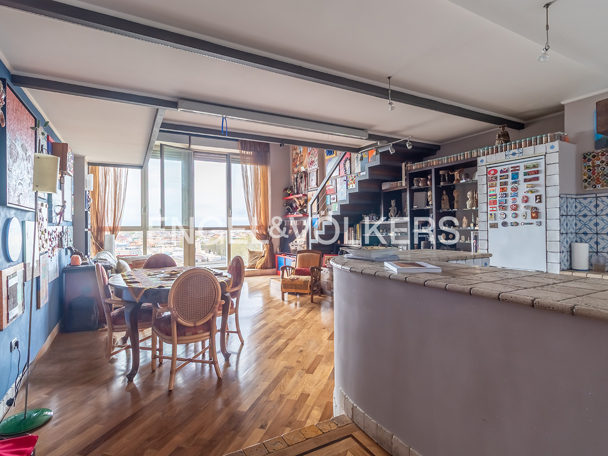 Panoramic high-floor apartment with cellar and covered parking at Porta Maggiore - San Giovanni