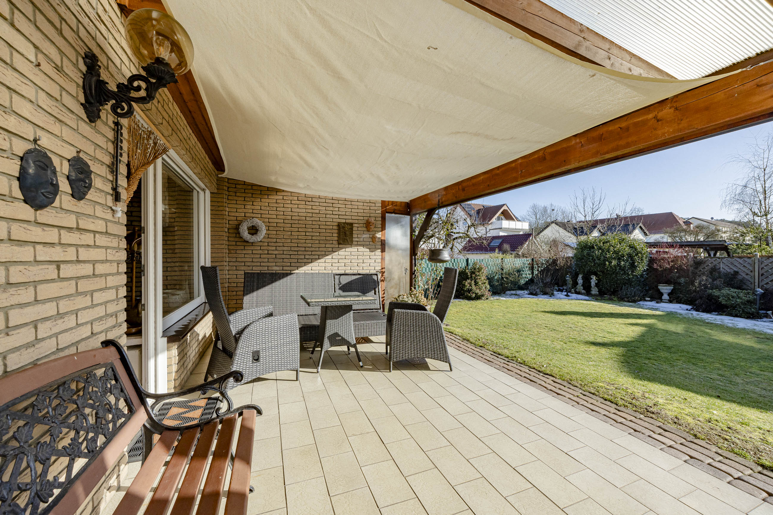 Gemütliches Einfamilienhaus mit Südgarten, Balkon & Sauna