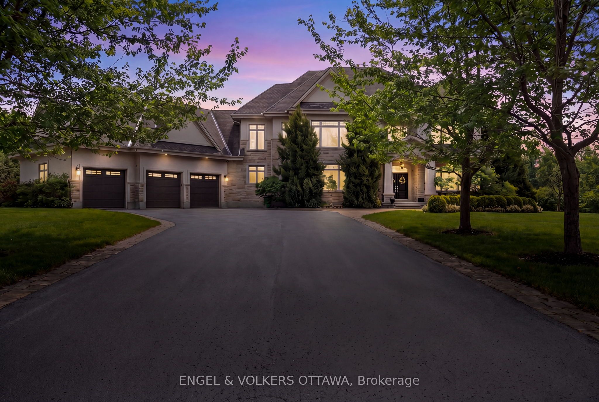 Set on a massive, beautifully maintained lot in Manotick