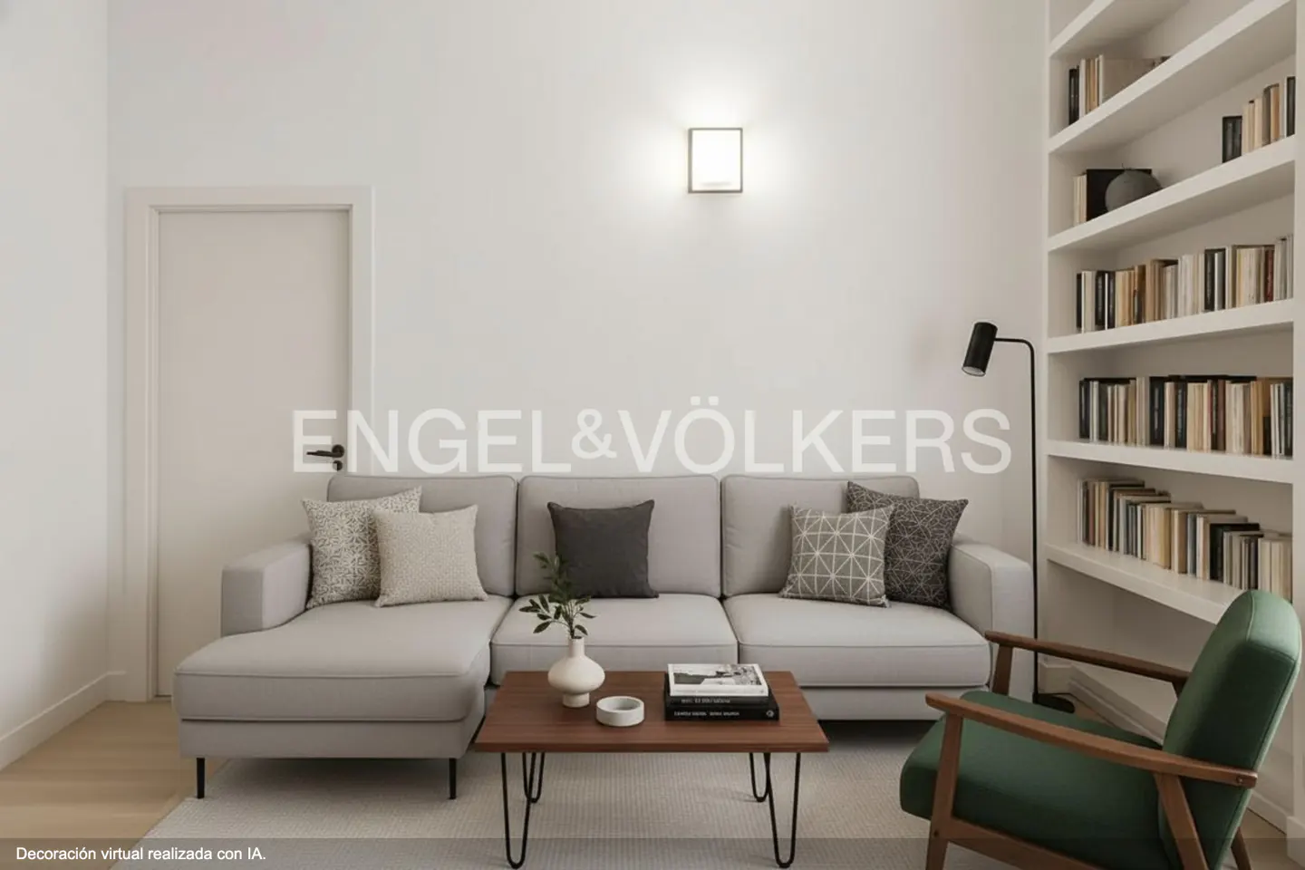 Modern living room with a light gray sectional sofa, wooden coffee table, green armchair, and built-in white bookshelves.