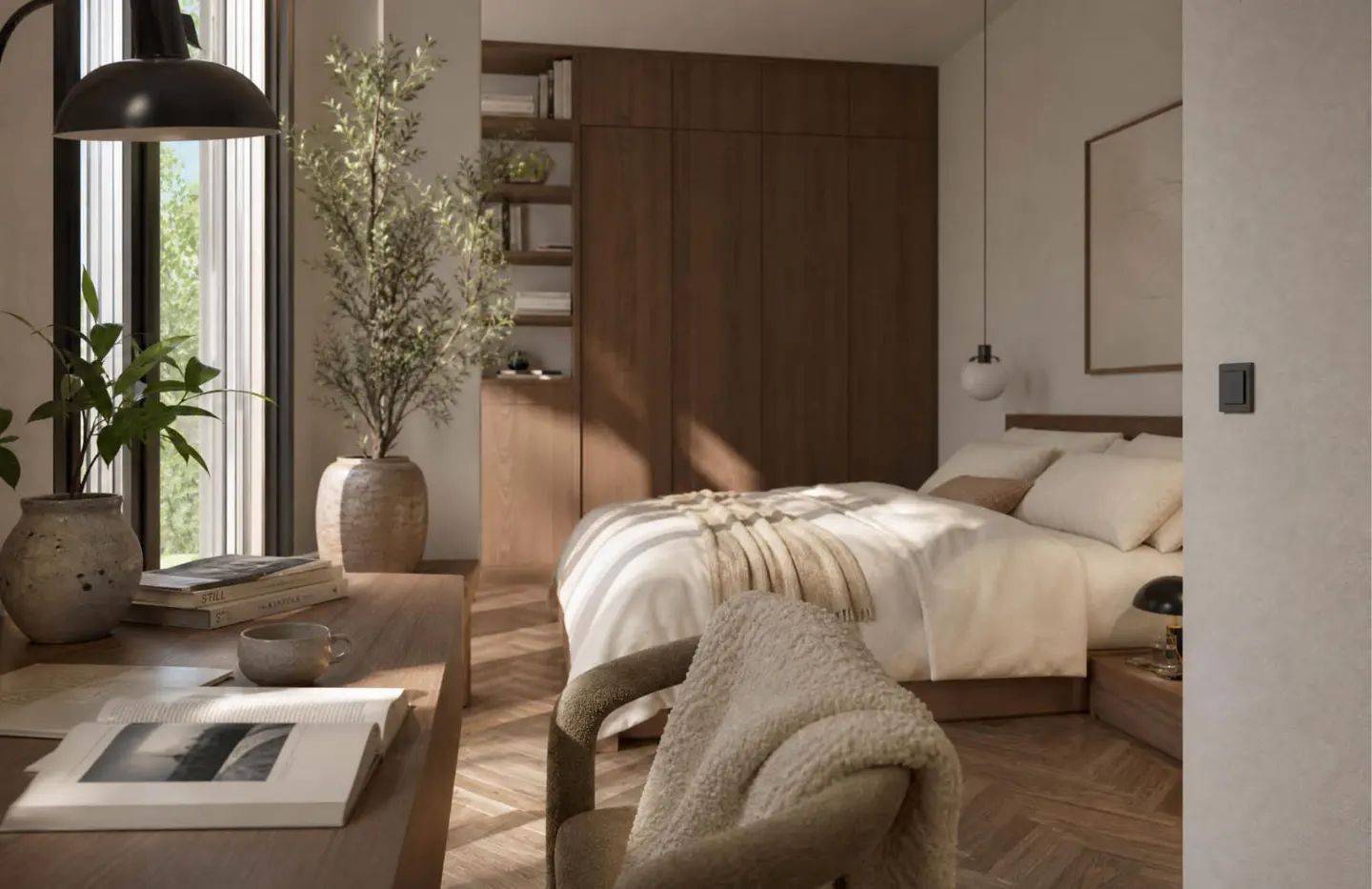 Modern bedroom with a wooden desk, a cozy armchair, and a bed with white linens, featuring warm lighting and wood accents.