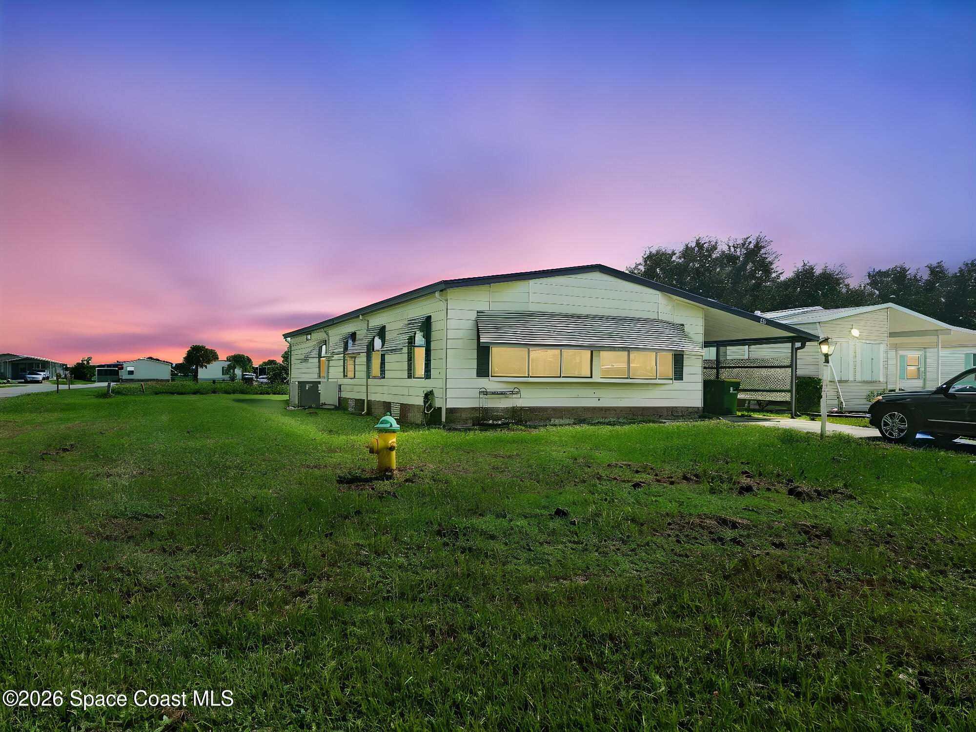 Spacious Barefoot Bay Home with a Canalfront Backyard