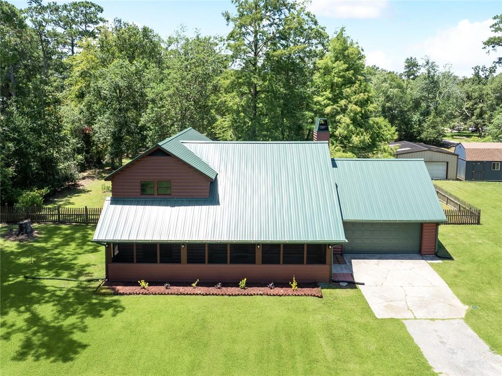 Lacombe Log Cabin on 1.48 Acres with Pond