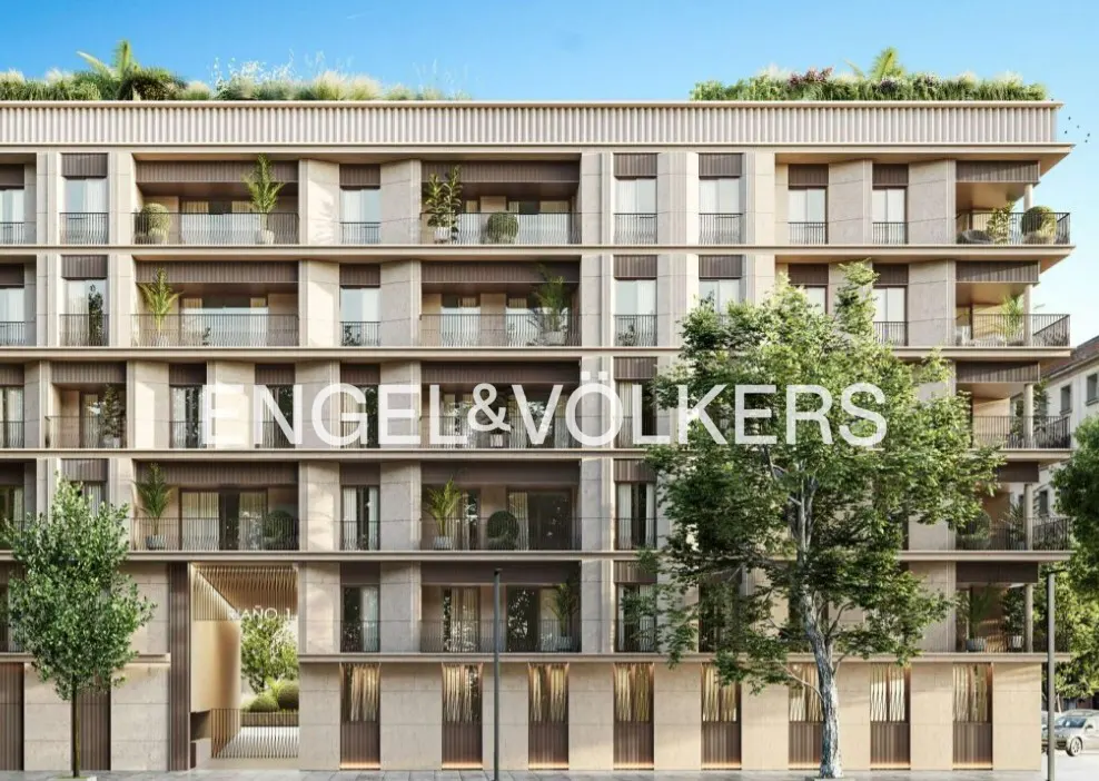 Modern multi-story apartment building with balconies, greenery, and an Engel & Völkers logo overlay.