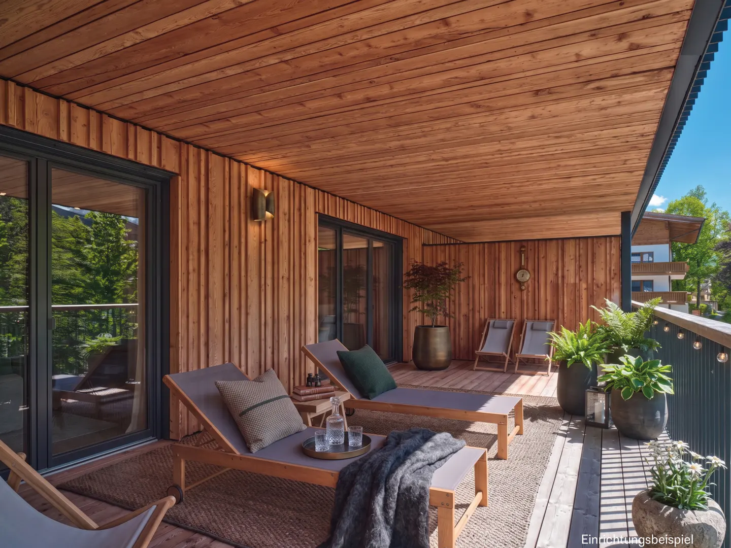 Modern wooden balcony with lounge chairs, potted plants, and a view of trees under a clear blue sky.