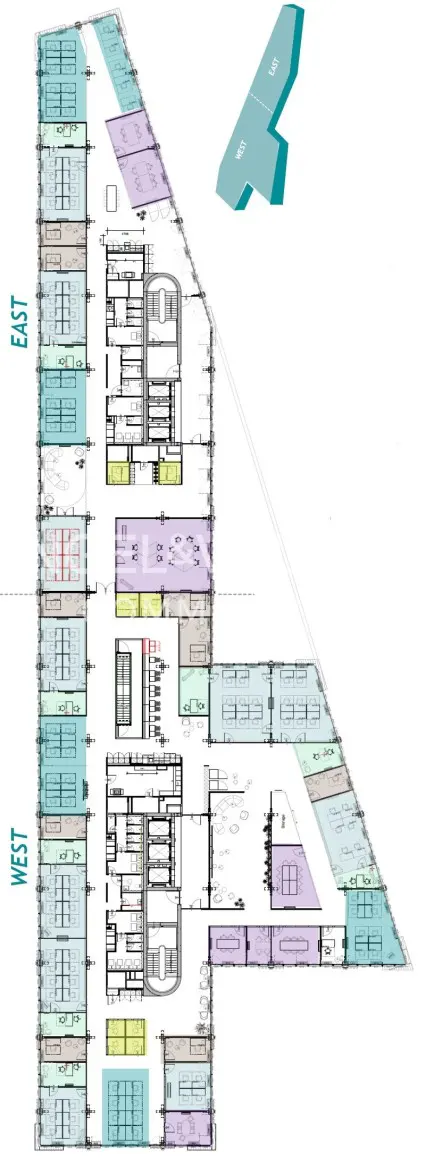 Floor plan of a commercial office building with color-coded zones, labeled East and West wings, and central elevator cores.