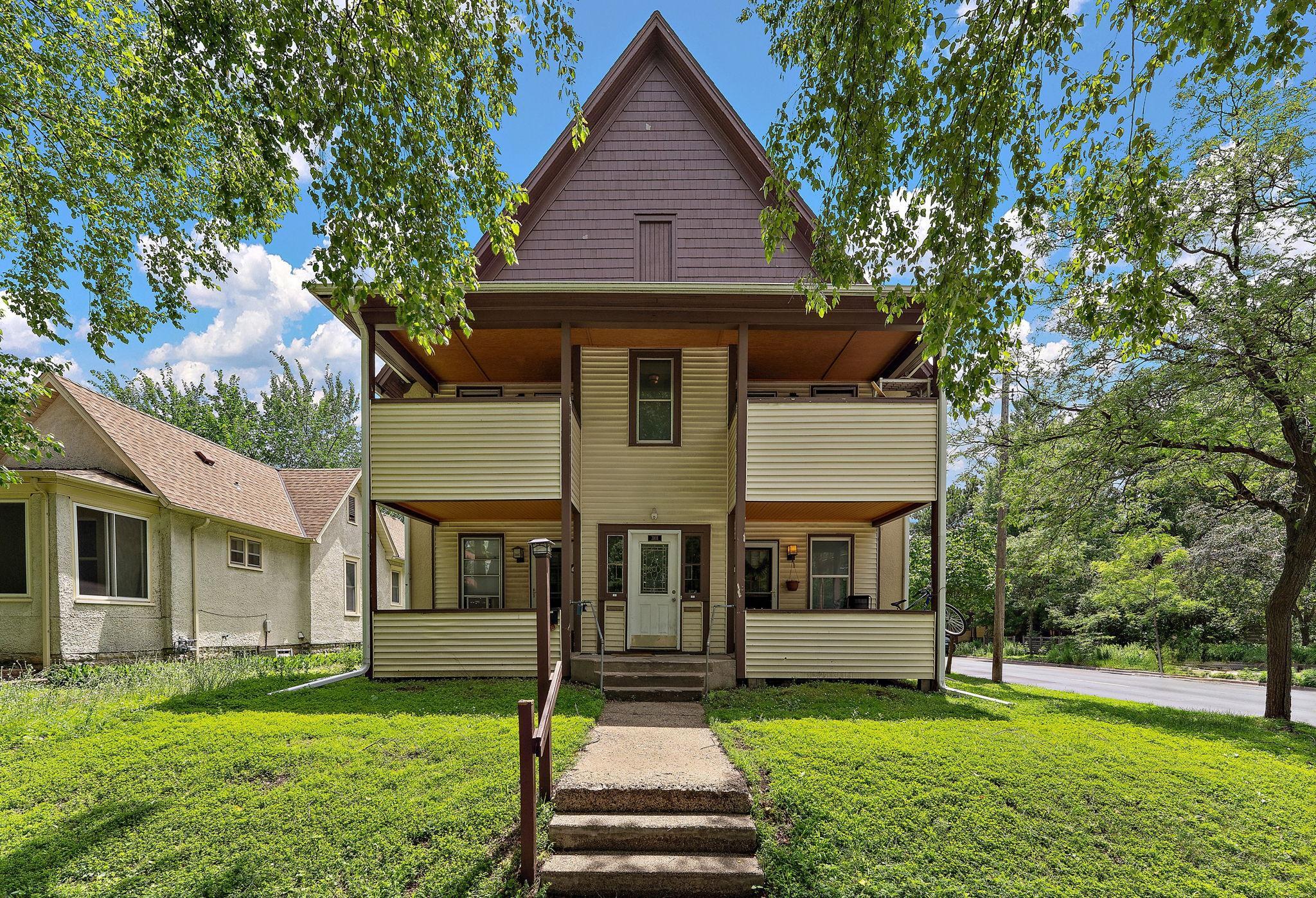 Rare Seward Fourplex: All 3-BR Units & 8-Car Parking
