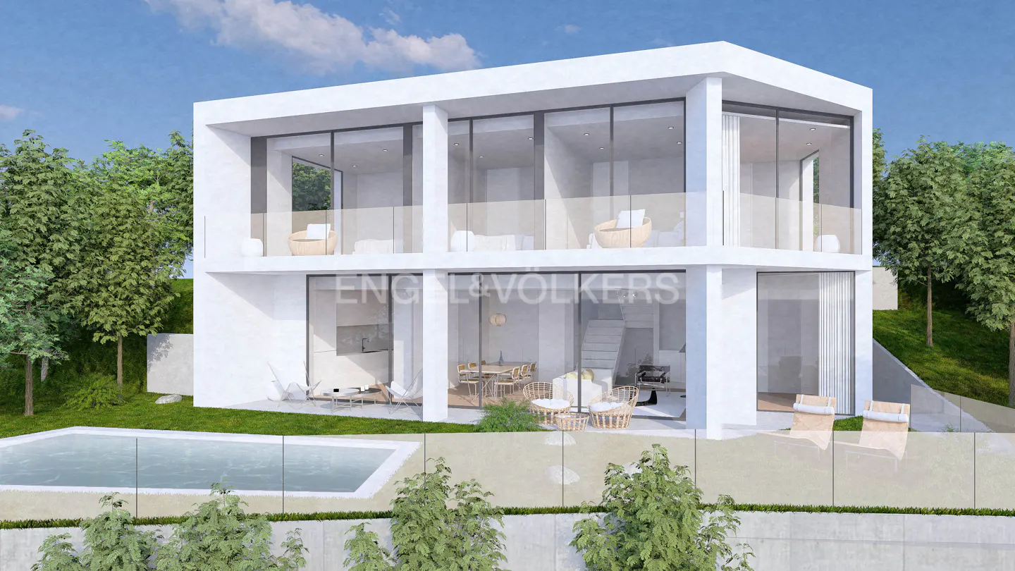 Modern two-story white house with large windows, a pool, and green trees under a blue sky. Interior furniture is visible through the glass.
