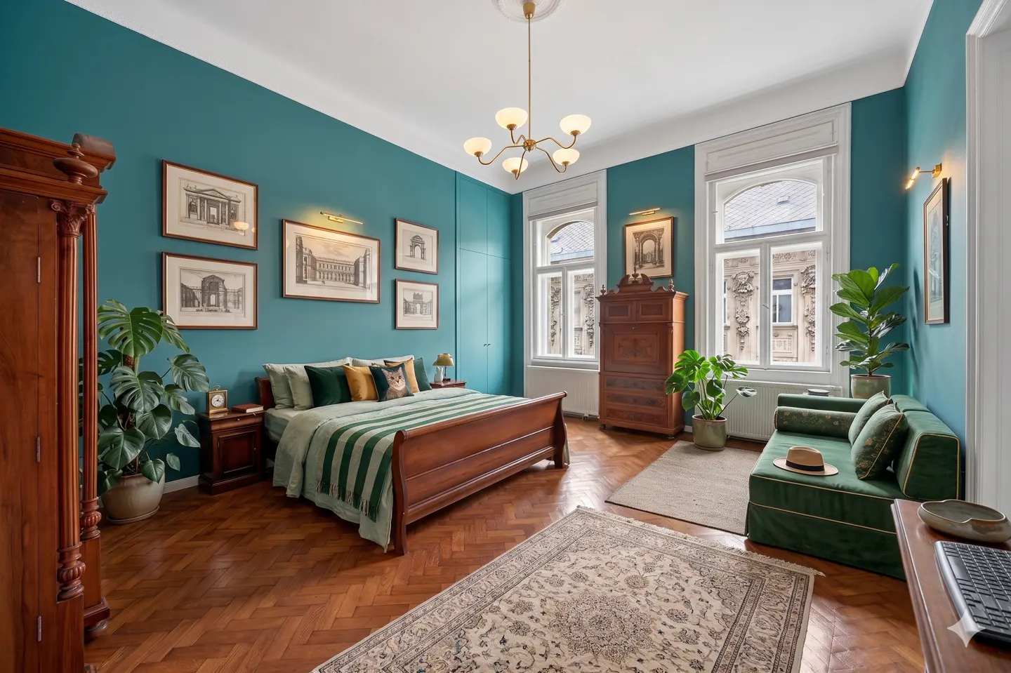 A bedroom with teal walls, wood floors, and antique furniture. A bed with green bedding, a green sofa, and potted plants are visible.