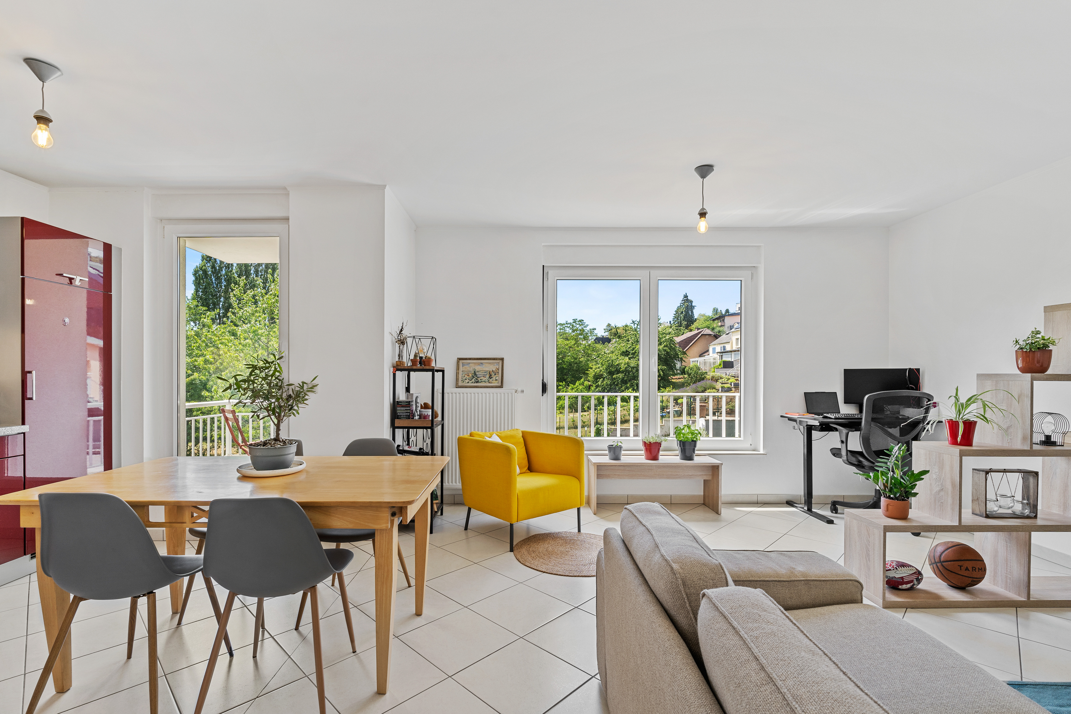 One-bedroom apartment in Fentange with balcony and indoor parking.