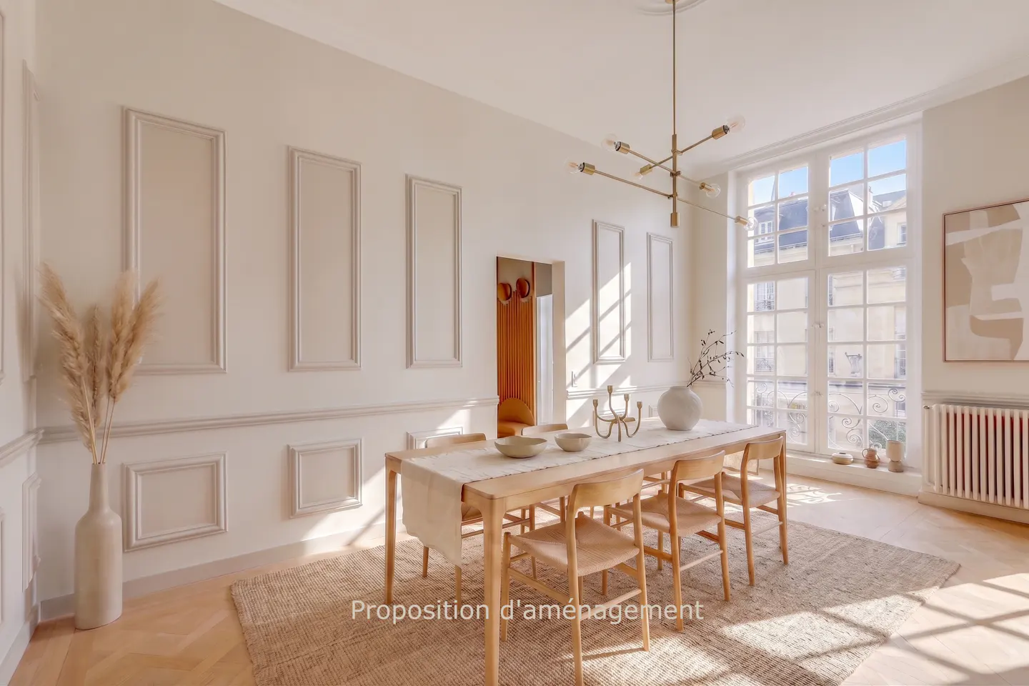 Bright dining room with a wooden table, chairs, jute rug, and large windows with natural light.