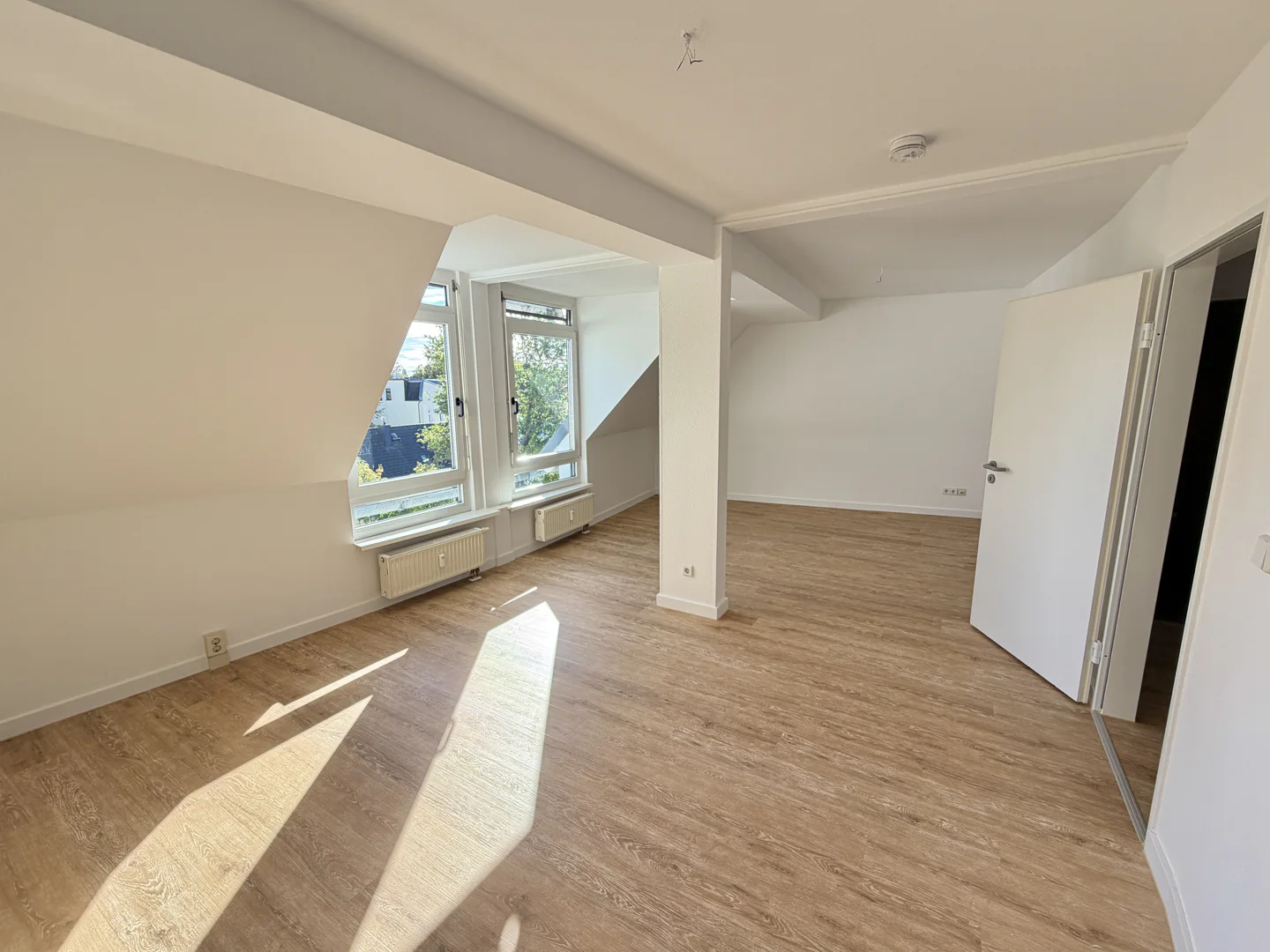 Lichtdurchflutete Maisonette-Dachgeschosswohnung mit Balkon in Magdeburg-Ottersleben - Foto 1
